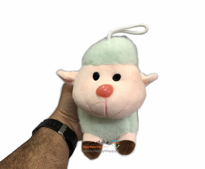 عروسک طرح گوسفند خوابیده سبز رنگ